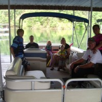 Jack Exum Jr and Wiwik on boat trip in Murphy, N.C. with family