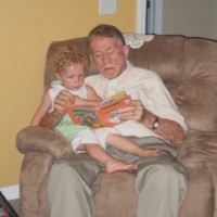 Dad reading to (Grand daughter)Alexandra