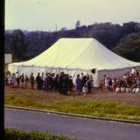 Crowds waiting to get in while Dad teaches the children (on the right)